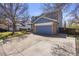 Charming two-story home with a well-manicured lawn, stone accents, and a cozy front porch at 11753 Elizabeth Cir, Thornton, CO 80233