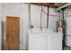 Practical laundry area with washer, dryer, and storage space, ready for use at 11753 Elizabeth Cir, Thornton, CO 80233