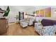 Bright and inviting living room with wood floors and comfortable seating arrangement at 11753 Elizabeth Cir, Thornton, CO 80233