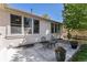 Charming patio area with seating and well-manicured lawn, offering a relaxing outdoor space at 11422 W Cooper Ave, Littleton, CO 80127