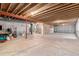 Unfinished basement with exposed ceiling, concrete floors, and potential for customization at 11422 W Cooper Ave, Littleton, CO 80127
