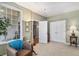 This cozy living room/office space has large bright windows, a comfy chair and plenty of room at 11422 W Cooper Ave, Littleton, CO 80127