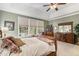 The main bedroom is brightly lit with lots of drawer space and ample closet space at 11422 W Cooper Ave, Littleton, CO 80127
