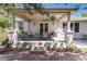 Inviting covered patio with stylish outdoor seating, perfect for enjoying the outdoors at 11422 W Cooper Ave, Littleton, CO 80127