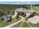 Aerial view of property including acreage, residence and outbuildings at 30886 County Road 17/21, Elizabeth, CO 80107