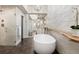 The bathroom features a modern free standing tub, walk-in shower, and double vanity at 30886 County Road 17/21, Elizabeth, CO 80107