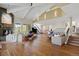 Large living room with high ceilings, fireplace and wood floors at 30886 County Road 17/21, Elizabeth, CO 80107