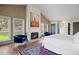 The spacious main bedroom features large windows, hardwood floors, and an en suite bathroom at 30886 County Road 17/21, Elizabeth, CO 80107