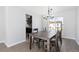 Dining area with hardwood floors and large windows at 12353 W Saratoga Ave, Morrison, CO 80465