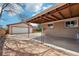 Cozy backyard patio with a covered area that is great for relaxing at 5540 E Jewell Ave, Denver, CO 80222
