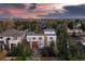 Aerial view of the home at dusk shows the surrounding neighborhood at 942 S Fulton St, Aurora, CO 80247