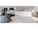 Home exercise room with treadmill, exercise ball and neutral color scheme at 942 S Fulton St, Aurora, CO 80247