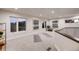 Bright and airy fitness room with large windows and ample space for equipment at 942 S Fulton St, Denver, CO 80247