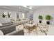 Bright living room with comfortable seating and stylish decor, offering a welcoming space at 942 S Fulton St, Denver, CO 80247