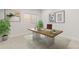 Bright office with decorative plants and large window, offering a pleasant and productive workspace at 942 S Fulton St, Denver, CO 80247