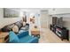 Comfortable living room with leather sofa, stylish coffee table and modern decor at 1454 Utica St, Denver, CO 80204