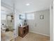 Functional office space with ample storage next to the adjacent bathroom at 1454 Utica St, Denver, CO 80204
