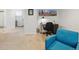 Office space area adjacent to living room with adjacent bathroom at 1454 Utica St, Denver, CO 80204