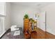 Home office with a window, hardwood floors, and good natural light at 1454 Utica St, Denver, CO 80204