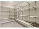 Basement storage area with multiple rows of shelving, providing ample space for organizing belongings at 297 N Coolidge Way, Aurora, CO 80018