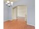 Open entryway showcasing an arched entrance and seamless transition between rooms at 297 N Coolidge Way, Aurora, CO 80018