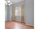 Living room offers natural light, hardwood floors, and a neutral color palette at 297 N Coolidge Way, Aurora, CO 80018