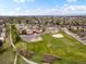 Community aerial view featuring a school with a large playground, baseball field, and ample parking at 5261 S Malta Way, Centennial, CO 80015
