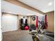 Basement featuring exercise equipment, media center and storage, perfect for recreation at 5261 S Malta Way, Centennial, CO 80015