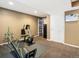 Basement area showcasing exercise equipment and convenient storage solutions at 5261 S Malta Way, Centennial, CO 80015