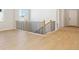 Open staircase with wood steps and black metal railings at 13805 Emerald Lake St, Parker, CO 80138