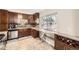 Modern kitchen with granite countertops, a stainless steel sink, and a wine rack at 2982 S Vrain St, Denver, CO 80236