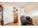Functional home office with hardwood floors, lots of storage, and great natural light at 2982 S Vrain St, Denver, CO 80236