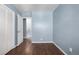 Bedroom with hardwood floors and a closet at 8023 Wolff St # C, Westminster, CO 80031