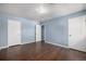 Bright bedroom with wood floors features three doors and plenty of natural light at 8023 Wolff St # C, Westminster, CO 80031
