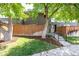 Well-maintained front yard with lush greenery and a charming brick townhouse facade at 8023 Wolff St # C, Westminster, CO 80031