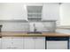 Kitchen featuring stainless steel sink and faucet at 8023 Wolff St # C, Westminster, CO 80031