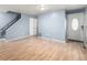 Inviting living room featuring hardwood floors, neutral paint, and plenty of natural light at 8023 Wolff St # C, Westminster, CO 80031