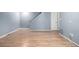 View of the hardwood floors leading to the stairs at 8023 Wolff St # C, Westminster, CO 80031