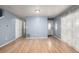 Inviting living room featuring hardwood floors, neutral paint, and plenty of natural light at 8023 Wolff St # C, Westminster, CO 80031