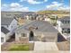Beautiful home with a three-car garage, stone accents, and a spacious yard, surrounded by stunning views at 863 Edenborn Pl, Castle Rock, CO 80104