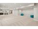 Bright and spacious finished basement with carpet, bar area, and recessed lighting at 863 Edenborn Pl, Castle Rock, CO 80104