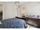 bedroom with dresser and closet located steps away from the en-suite bathroom at 863 Edenborn Pl, Castle Rock, CO 80104