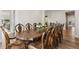 Formal dining room with a large wooden table, seating for ten, and elegant decor for memorable gatherings at 863 Edenborn Pl, Castle Rock, CO 80104