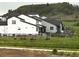 Lovely modern home features a grassy area with elk grazing peacefully at 863 Edenborn Pl, Castle Rock, CO 80104