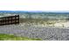 Beautiful hillside landscape design with grassy and rock features at 863 Edenborn Pl, Castle Rock, CO 80104