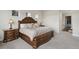 Elegant main bedroom featuring a plush king bed, sophisticated furnishings, and abundant natural light at 863 Edenborn Pl, Castle Rock, CO 80104