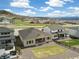Stunning backyard with lush lawn, privacy fence, and patio area perfect for outdoor entertaining and relaxation at 863 Edenborn Pl, Castle Rock, CO 80104