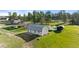 Aerial view of a large barn and surrounding green space at 10522 Bayou Gulch Rd, Parker, CO 80134
