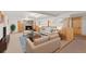 Finished basement with a cozy seating area, fireplace, and stylish wood accents at 10522 Bayou Gulch Rd, Parker, CO 80134