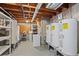 Basement with water heaters and storage shelving at 10522 Bayou Gulch Rd, Parker, CO 80134